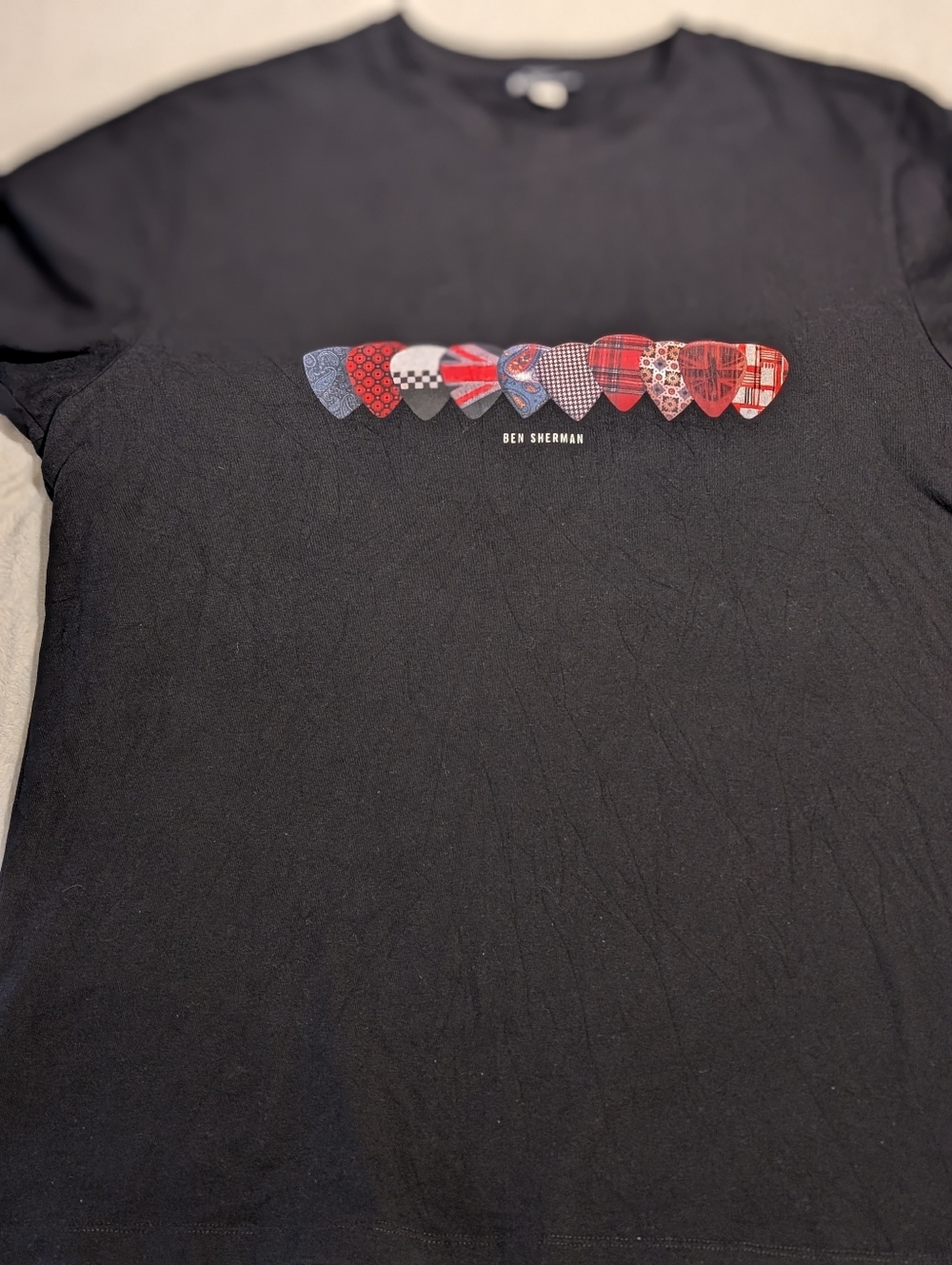 Ben Sherman Black Tee with Row of Red and Blue Guitar Pick Graphics. Xl